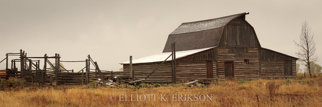 John Moulton barn with snow-capped roof on a cold autumn day.